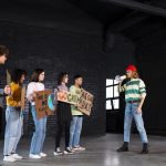 young-people-protesting-together-full-shot